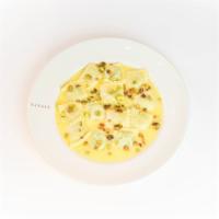 Quadrati Con Ricotta E Spinaci · Housemade stuffed pasta with Calabro ricotta and spinach finished with lemon butter sauce an...