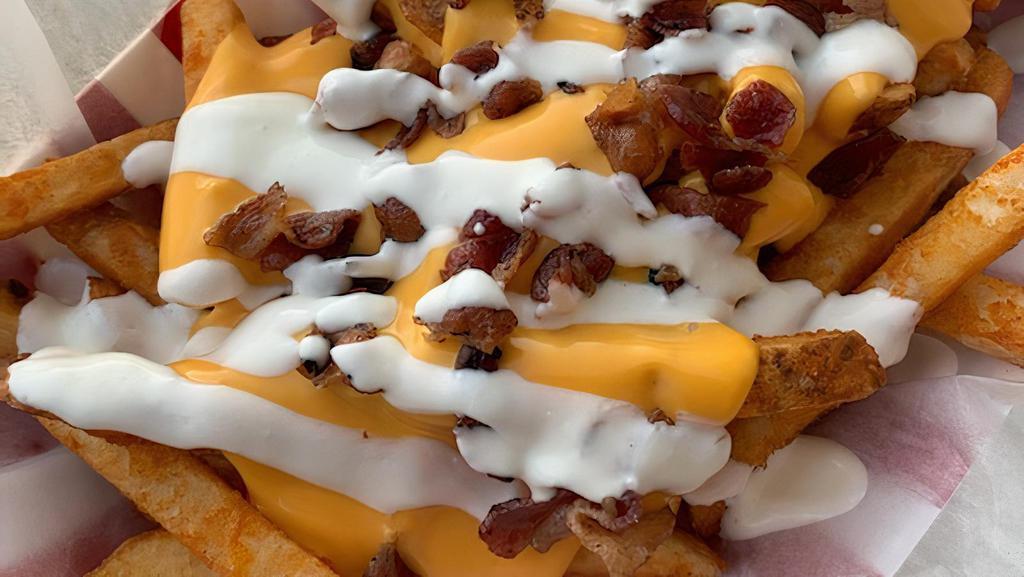 Loaded Fries · French Fries topped with Cheese, Bacon and Sour Cream