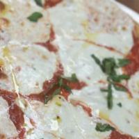 Margherita Pizza Large · Tomato, Fresh Mozzarella, Basil, Extra Virgin Olive Oil