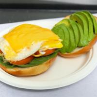 Avocado Omelet & A Bagel With Butter · Fresh avocado, tomato, onions, banana peppers and cheddar cheese. Served with home fries or ...