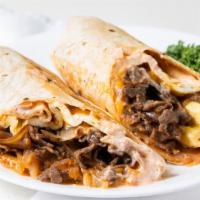 Burrito Wrap · Four scrambled eggs, steak, cheddar cheese, jalapeno, onions, salsa and sour cream.