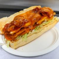 Chicken Cutlet Wrap · Breaded chicken cutlet, crispy bacon, melted Swiss cheese, lettuce, tomato and herb mayo on ...