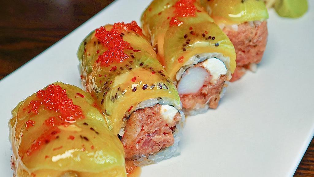 Lava Roll (8Pcs) · Crab meat, spicy tuna, cream cheese rolled inside out, topped with fresh sliced mango and kiwi and tobiko served with chef's speical sauce