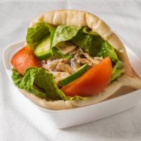 Chicken Gyro · Layers of marinated chicken breast are wrapped around a large vertical spit and grilled in f...