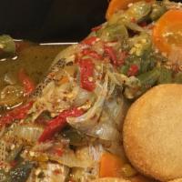 Snapper Paradise · Snapper steamed garnished with okras, carrots, various colors bell peppers, and hot scotch b...