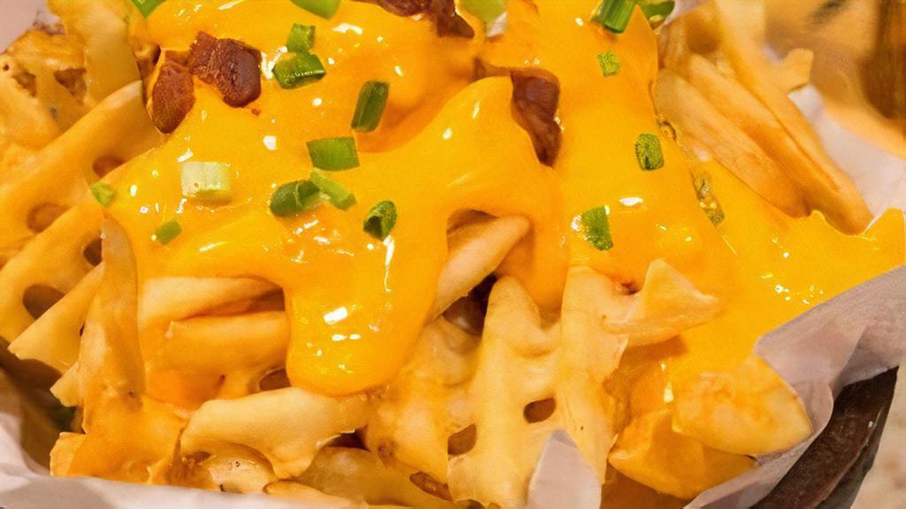 Bacon Cheese Fries · Delightful bacon cheese fries.