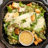 Caesar · Romaine Hearts, Red Leaf, Asiago Cheese, Homemade Croutons, Caesar Dressing.