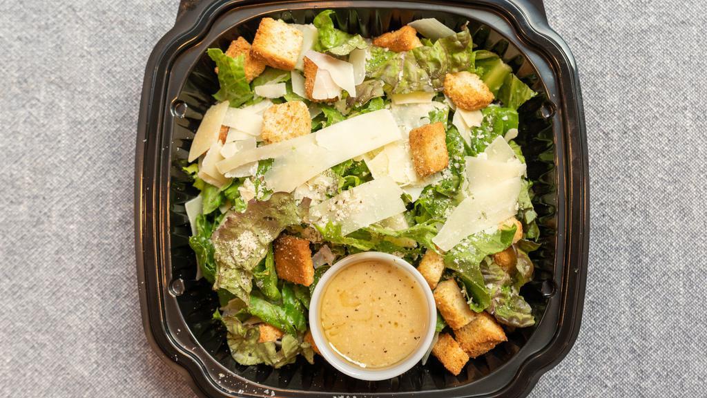 Caesar · Romaine Hearts, Red Leaf, Asiago Cheese, Homemade Croutons, Caesar Dressing.