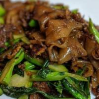 Pad See Eiw · Flat noodle sauteed with Chinese broccoli and egg.