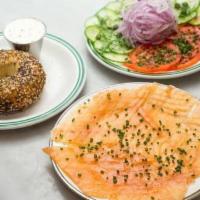 Smoked Scottish - Sesame Bagel Choice · Served with bagel, tomato, cucumber, onions, and capers.