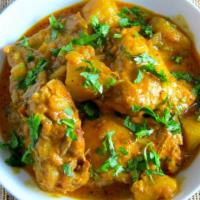 Chicken Curry · Gluten free. Skinless and boneless chicken cooked in rich gravy curry sauces.
