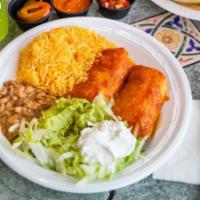 Chimichangas · Fried tortillas stuffed with cheese
and choice of shredded beef, chicken or ground beef
with...