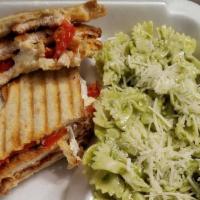 Pesto Panini · Chicken cutlet with fresh mozzarella, roasted peppers and mayo.