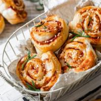 Pizza Roll · Freshly made dough wrapped around marinara, cheese and our house herbs and seasonings, baked...