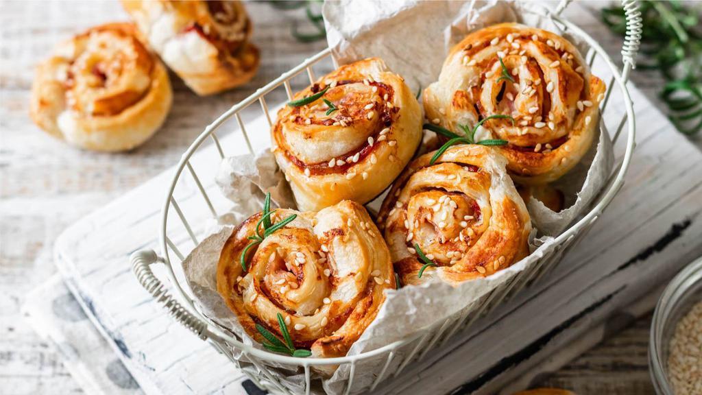 Spicy Pizza Roll · Freshly made dough wrapped around marinara, piquant spices cheese and our house herbs and seasonings, baked fresh.