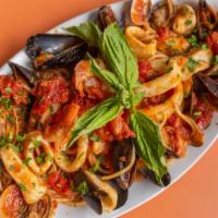 Frutti Di Mare · Combination of fresh clams, mussels, calamari, and shrimps in our delicious red wine sauce a...