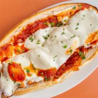 Chicken Parmigiana · Topped with fresh tomato and melted mozzarella.