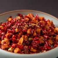 Chicken With Szechuan Pepper · Deep Fried Boneless chicken with Chili Pepper and Szechuan pepper