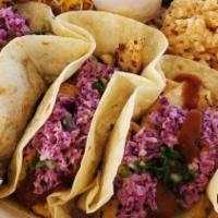 Fish Taco · Catch of the day, house slaw and salsa.