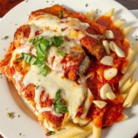 Eggplant Rollatine Pasta · Stuffed with ricotta and mozzarella, baked with tomato sauce and cheese, served with spaghet...