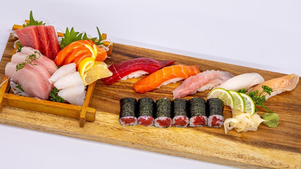 Sushi-Sashimi Combo · One pieces sushi, 12 pieces sashimi, one tuna roll.