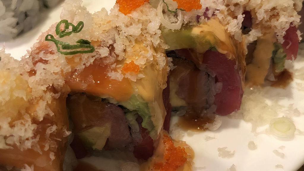 Tiger Roll · Tuna, salmon, and avocado inside tuna, salmon, eel, avocado on top, served with eel sauce masago, scallion, crunchy with spicy mayo.