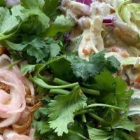 Satay Chicken Bowl · steamed rice, lemongrass, peanut sauce, cucumber, tumeric, lime, cilantro