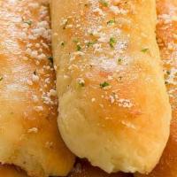 Hot Dip And Breadsticks (3) · Warm and soft garlic and parmesean breadsticks served with your chice of marinara or cheese ...