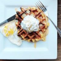 Cinnamon Roll · It's a cinnamon roll, it's a waffle, it's super delicious. Topped with icing, whipped cream,...