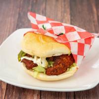 Torta De Milanesa Res O Pollo · Breaded meat or chicken, lettuce, tomato, onion, Oaxaca cheese, jalapeno pepper, avocado, re...