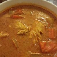 Yellow Curry · Hot. Choice of chicken, beef or pork cooked in yellow curry coconut milk with onion, potatoe...