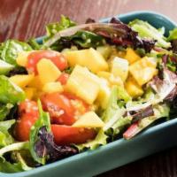 Mango Salad · Vegan. tomatoes, choclo, cucumber, quinoa, and mixed greens with passion fruit vinaigrette.