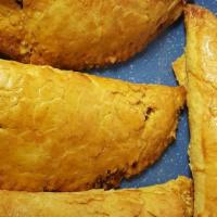 Beef Patty · Flaky pastry filled with delightfully seasoned beef.
