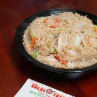 Mixed Fried Rice · Aromatic rice cooked with chicken, shrimp, shredded vegetables and eggs in butter and chef m...
