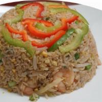 Shrimp Fried Rice · Aromatic rice cooked with shrimp, shredded vegetables and eggs in butter and chef made fried...
