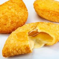 Cheese Empanada · Creamy cheese filled in a golden pastry shell.