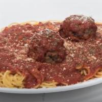 Pasta & Meatballs · Penne pasta with two giant meatballs & tomato sauce.