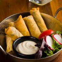 Moroccan Cigars · Contains Sesame.  Deep fried dough filled with vegan mince beef,  served with a side of tahi...