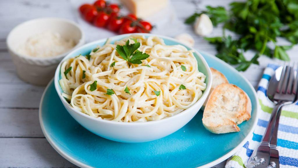 Linguine Alfredo · Mouthwatering pasta dish made with linguine pasta and tossed in butter and parmesan cheese.