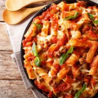 Baked Ziti · Mouthwatering pasta dish made with ziti pasta and a Neapolitan-style tomato-based sauce.