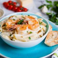 Seafood Pasta · Mouthwatering pasta dish made with customer's preference of pasta, clams, mussels, shrimp, a...