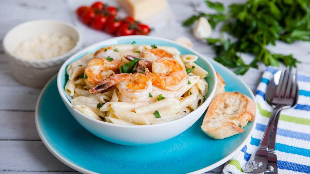 Seafood Pasta · Mouthwatering pasta dish made with customer's preference of pasta, clams, mussels, shrimp, and calamari.
