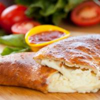 Cheese Calzone · Ricotta and Mozzarella Cheese stuffed and folded inside Pizza Dough and baked to perfection.