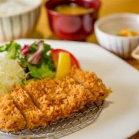 Tonkatsu · Breaded and deep fried silky pork loin cutlet served with original tonkatsu sauce. Served wi...