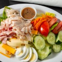 Chef Salad · Gluten free. Leaf lettuce, tomato, cucumber, hardboiled egg, turkey, ham, swiss and cheddar ...