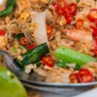 Classic Thai Fried Rice · Thai-style fried rice with onion, scallion, carrot and egg.