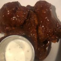 Sweet T'S Fried Or Bbq Wings · Crispy fried chicken plain wingettes or tossed in our signature bbq sauce. Served with a dip...