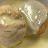 Homemade Biscuits And Gravy  · Two homemade buttermilk biscuits smothered in our chicken sausage gravy