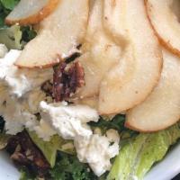 Fresh Baby Kale, Pear And Goat Cheese Salad · Fresh baby kale, pear and goat cheese salad sprinkled with candied walnuts and tossed in a t...