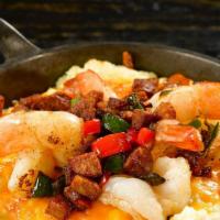 Classic Southern Shrimp And Grits · Gluten-free. grilled Jumbo shrimp and stone-ground cheese grits topped with chicken  sausage...